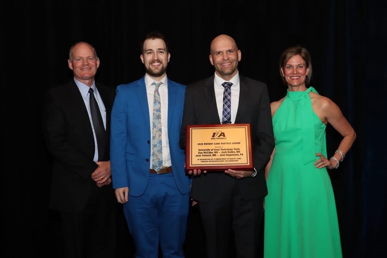 Team accepting award